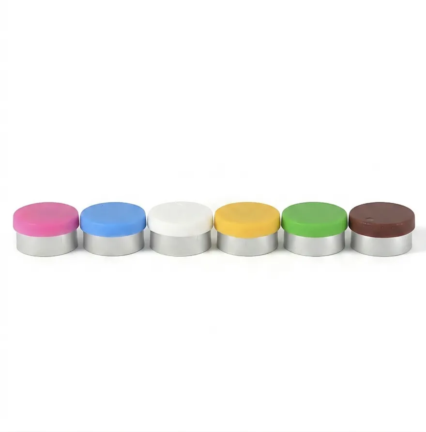 Six aluminum flip-off caps with colored plastic buttons: pink, blue, white, yellow, green, and brown