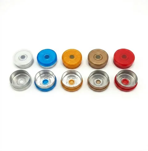 Two rows of colored aluminum crimp caps shown from the top and underside