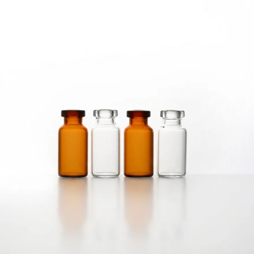 Four 10 mL vials lined up in a row, alternating amber and clear glass