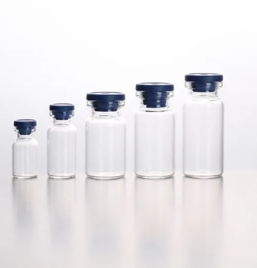 Glass vial shown with stopper and closure components
